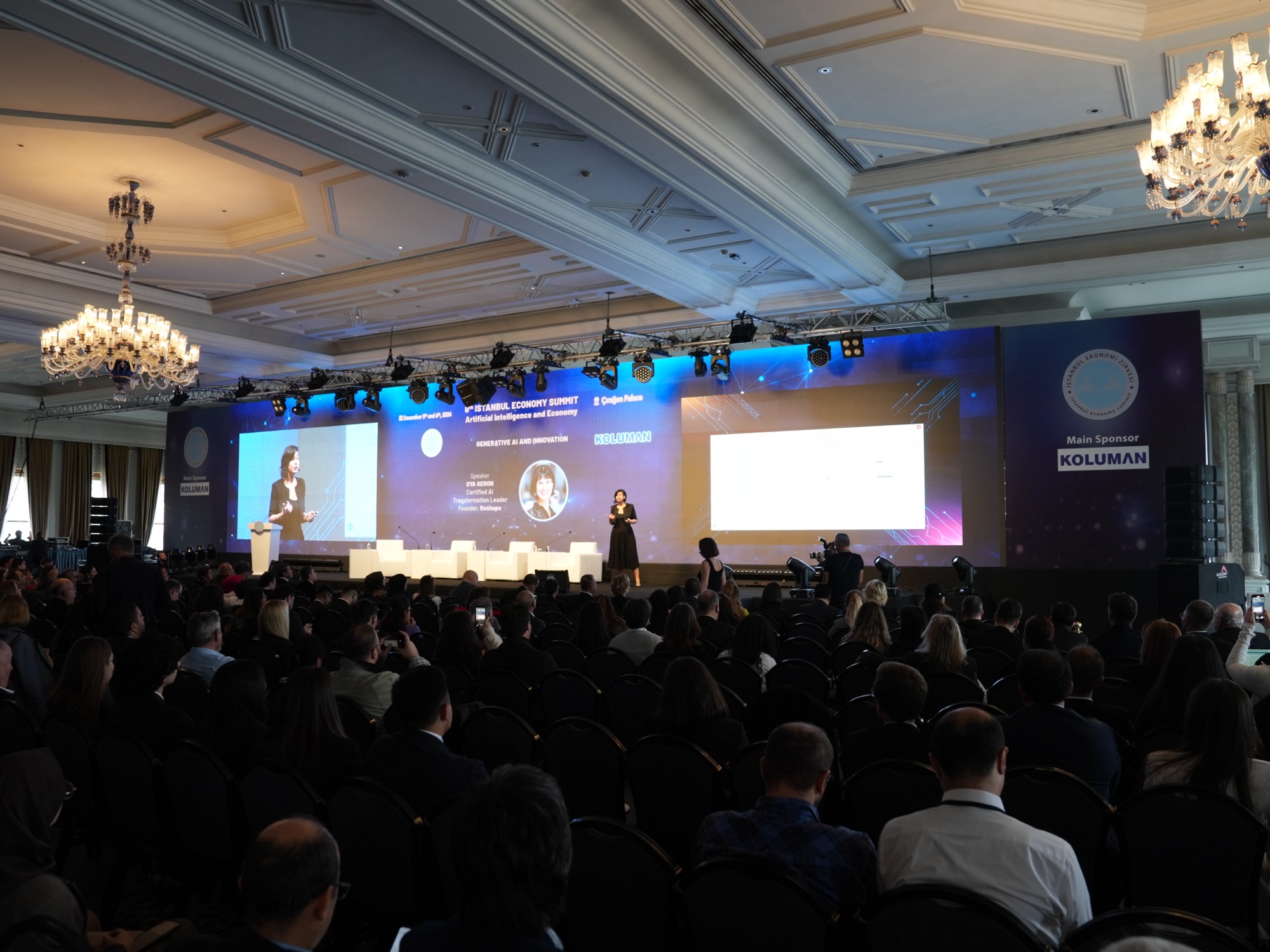 Oya Geron delivering a keynote to a full ballroom at the Istanbul Economy Summit, Çırağan Palace